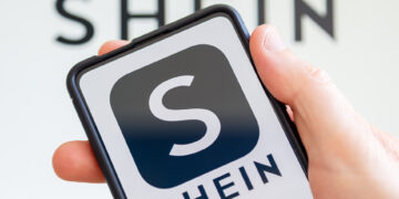 Stuttgart,,Germany,-,July,20,,2023:,Hand,Holding,A,Mobile